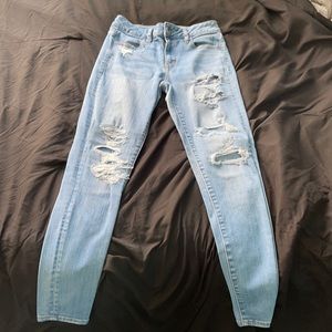 Ripped blue jeans size 2